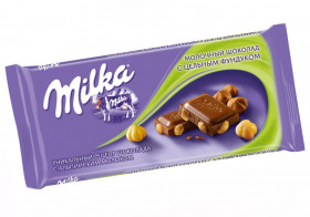 Шоколад Милка молочный целный фундук 90 г. 